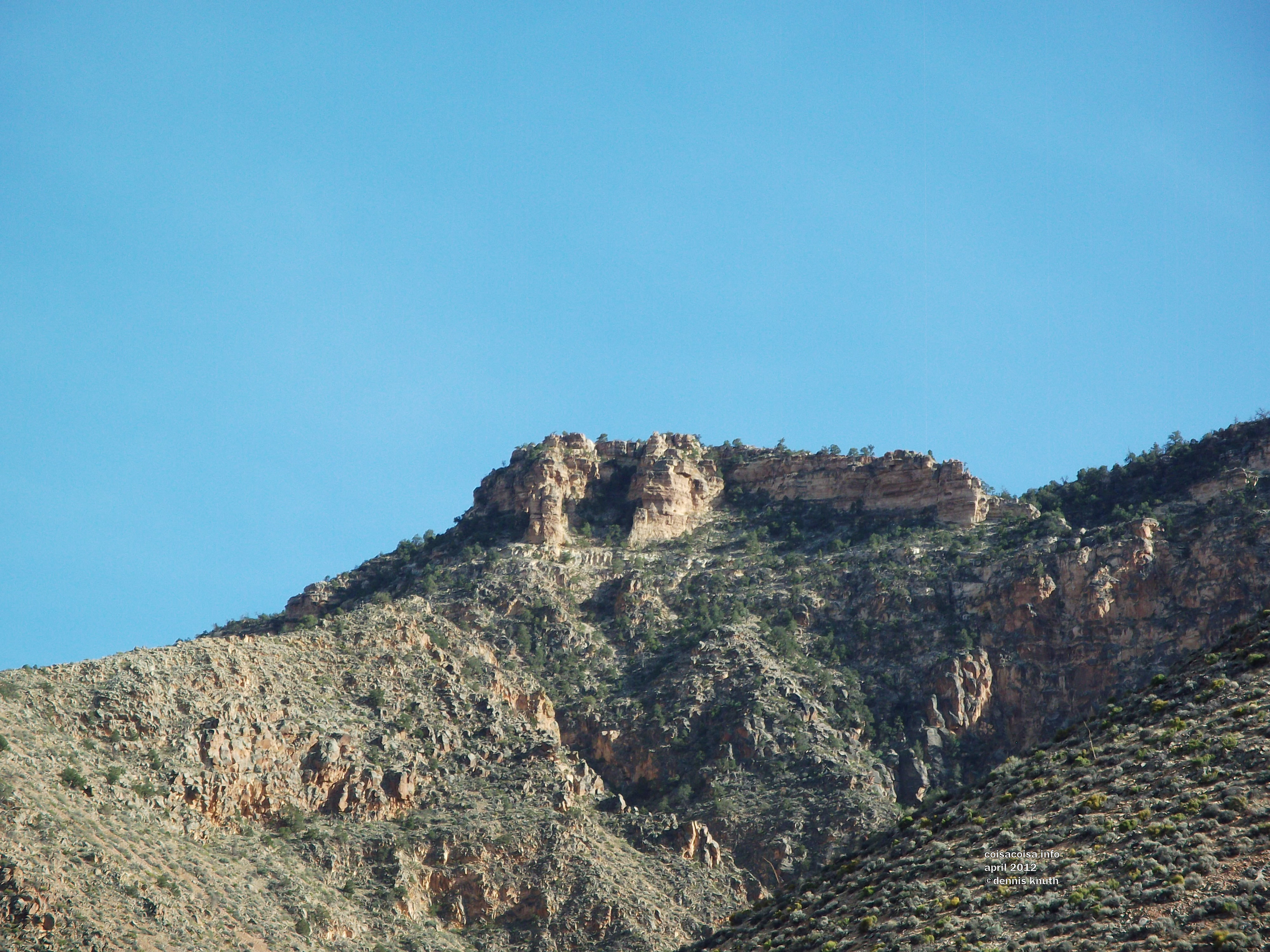 Rock pinnacles jut up from the mounds along highway 64