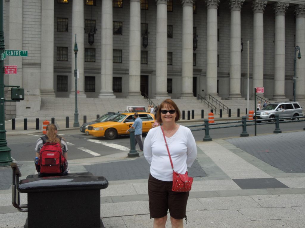 Sherri at a many columned buildin